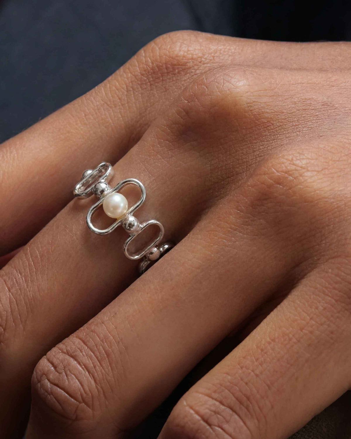 Ring aus Silber mit Perle und Logo Libre