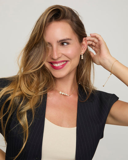 Lange goldene Ohrringe mit Perlen Petit