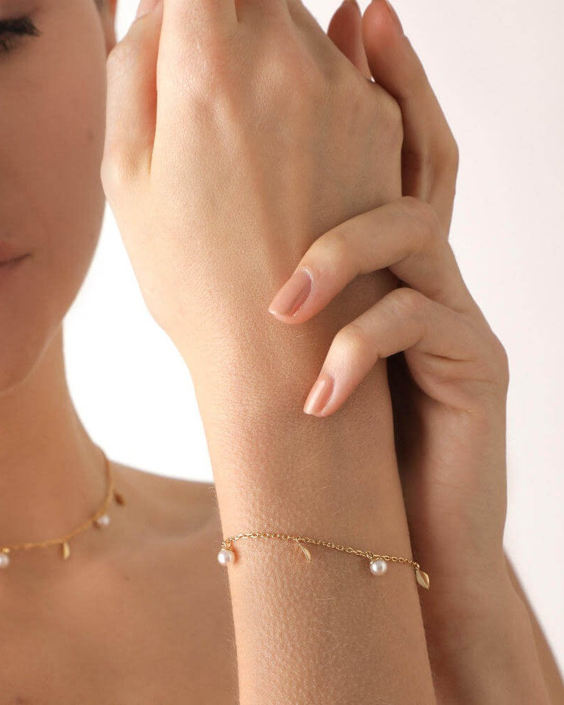 Verstellbares Armband Blätter und Perlen 4mm Gold Romea