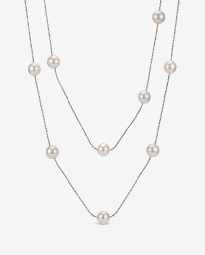 Collar de perlas y cadena de plata