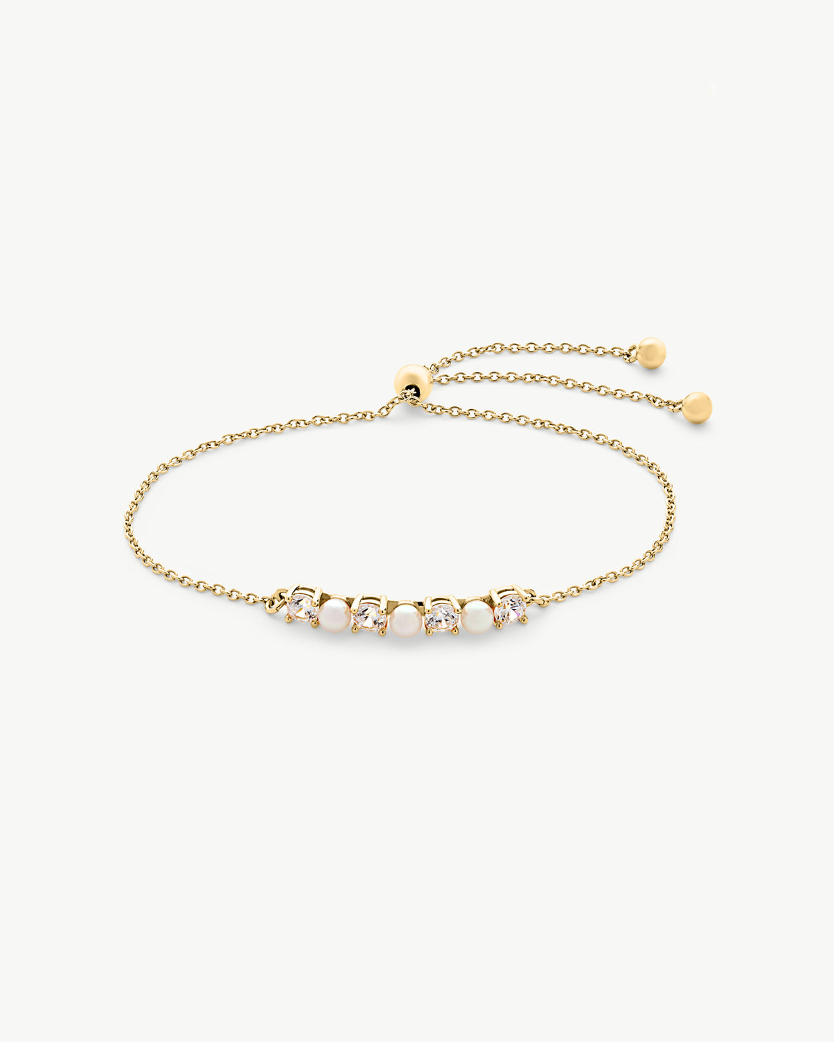 Kettenarmband mit Perlen und goldenen Zirkonia