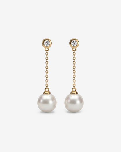 Lange Diamant- und Perlenohrringe Gold