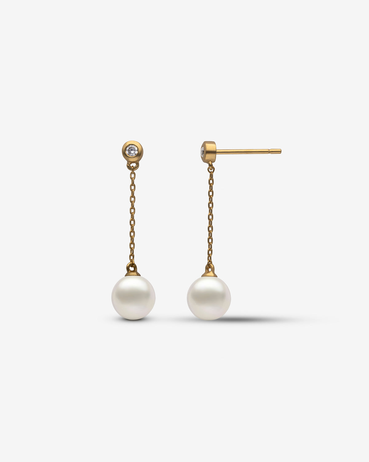 Lange Diamant- und Perlenohrringe Gold