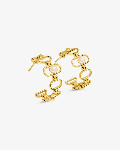 Pendientes de aro en plata bañada en oro 18k con perla y logo Libre