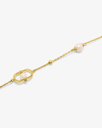 Pulsera de cadena en plata bañada en oro 18k con perlas y logo Libre