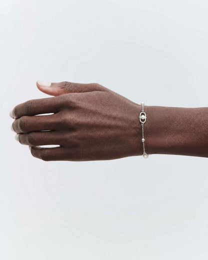 Pulsera de cadena en plata con perlas y logo Libre