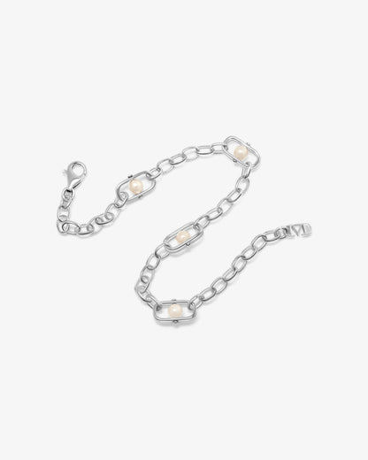 Pulsera de eslabones en plata con perlas y logo Libre