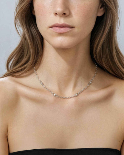Silver choker with pearls and logo Libre