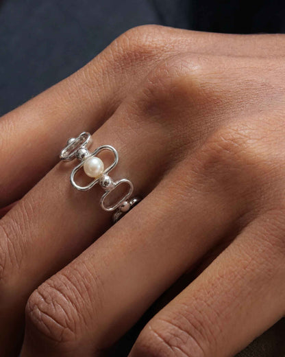Ring aus Silber mit Perle und Logo Libre