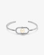 Pulsera rígida en plata con perla y un detalle de circonitas Libre