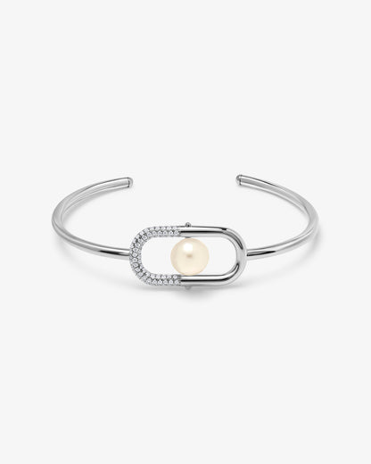 Pulsera rígida en plata con perla y un detalle de circonitas Libre