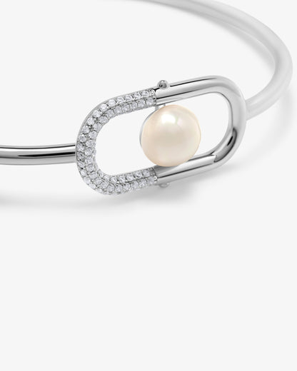 Pulsera rígida en plata con perla y un detalle de circonitas Libre