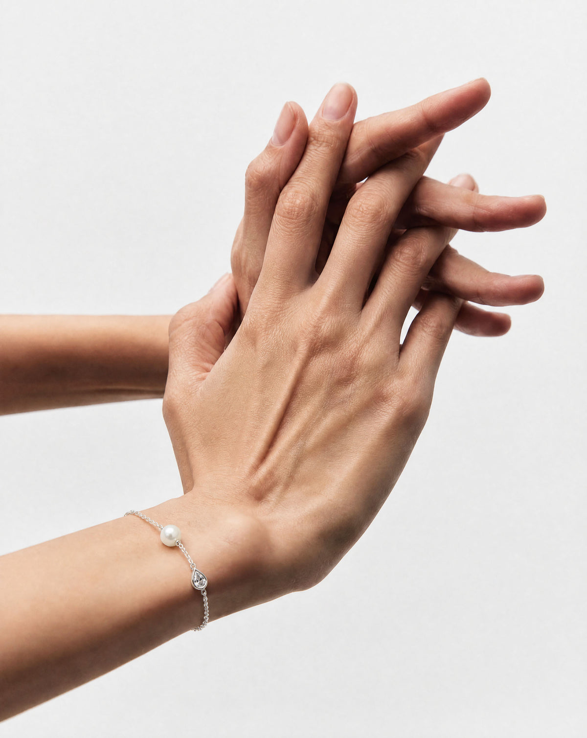 Armband aus Sterlingsilber mit zentraler Perle und Zirkonia Nova