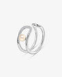 Open sterling silver ring with a half-pearl and a zircon detail, Libre
